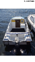 Vendo barca ligni semicabinato mt 4.60 con motore Yamaha 25cv 2 tempi e carrello omologato
